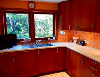 Cruachan Holiday Home | Scottish Highlands | Kitchen and 24″ Television with Freesat
